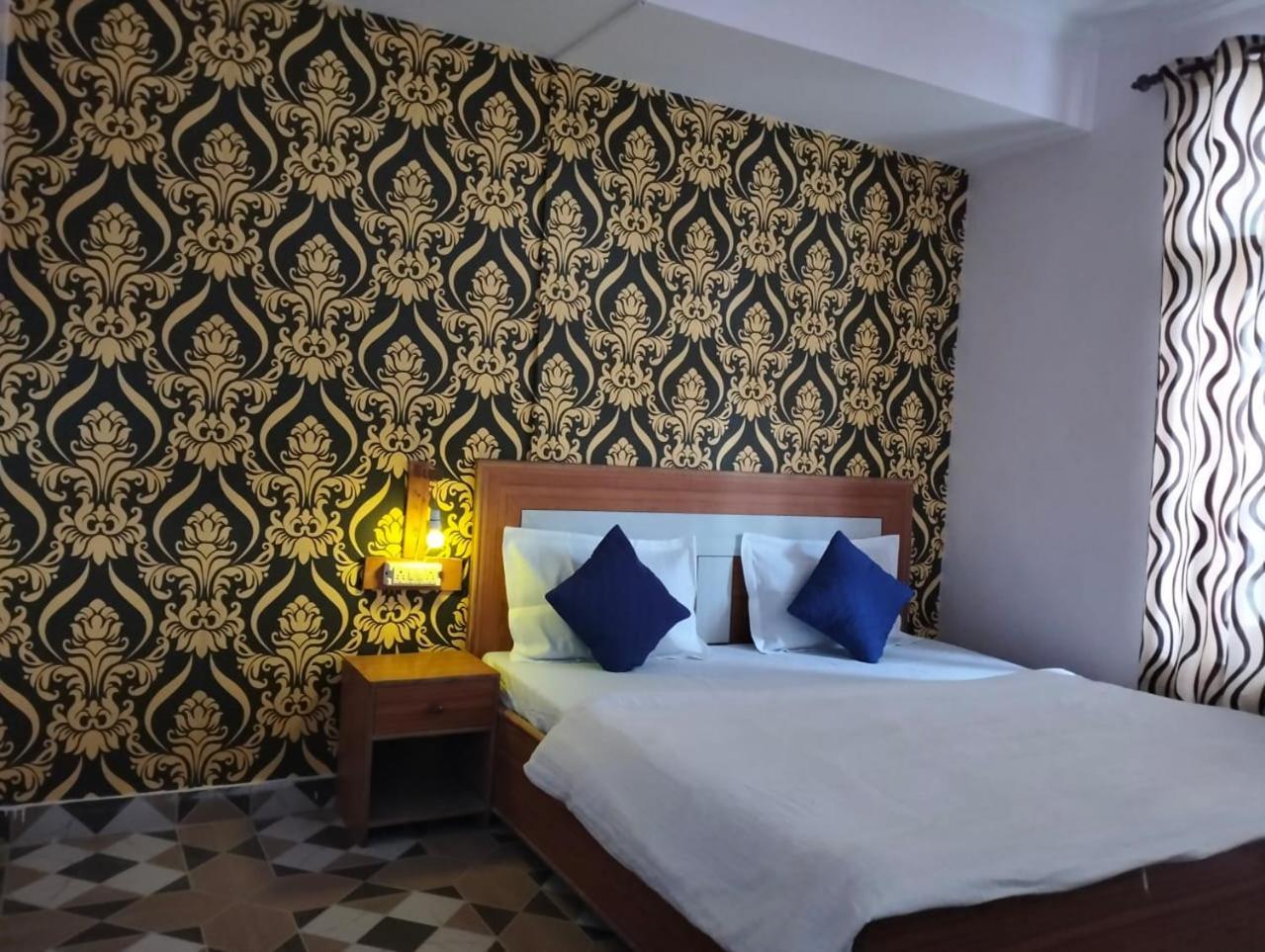 Aman Inn Дармсала Экстерьер фото
