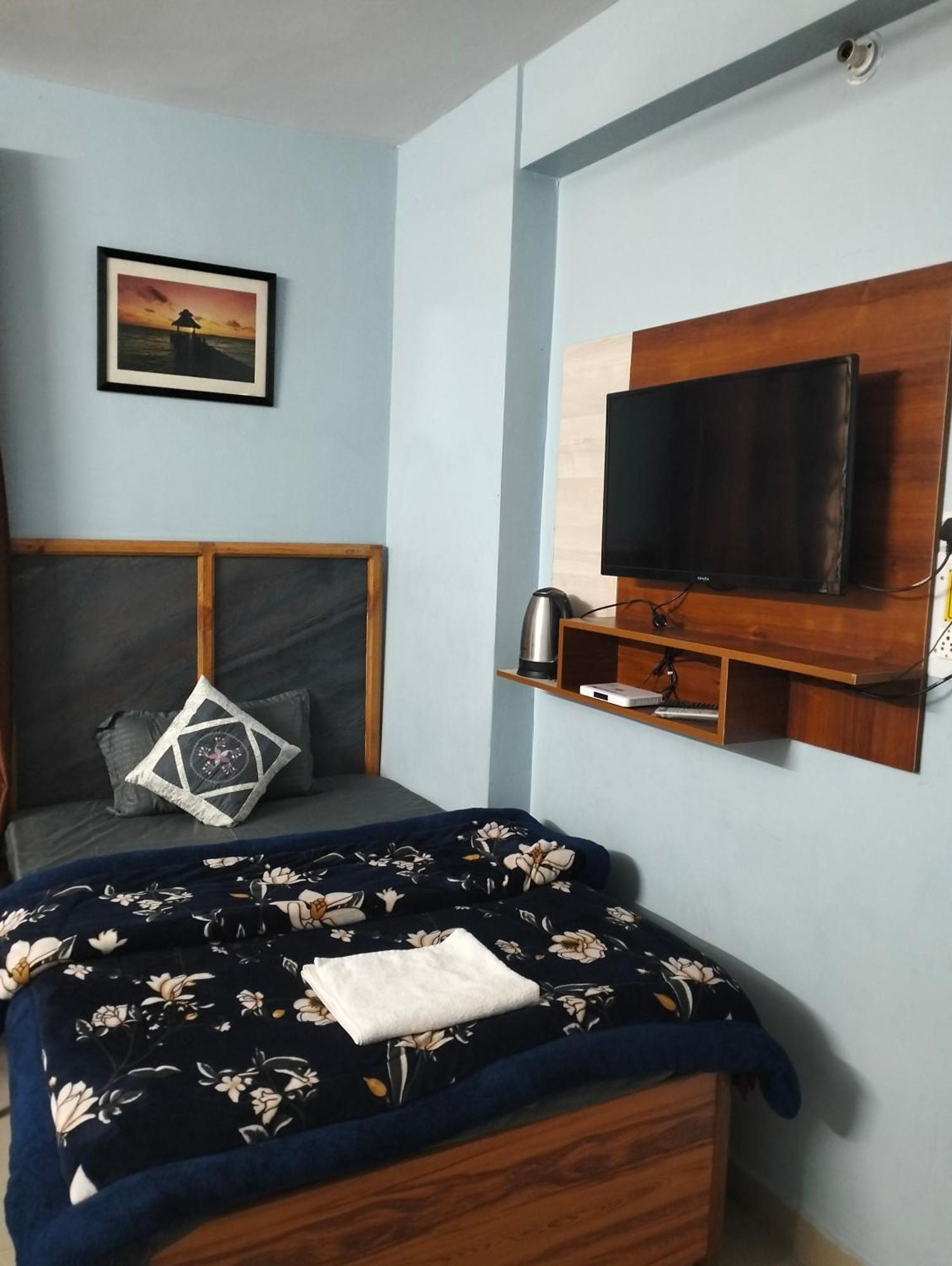 Aman Inn Дармсала Номер фото
